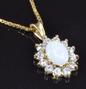 A 9ct gold pendant set with an opal surrounded by cubic zirconia, on 9ct gold chain, 2.4g, length
