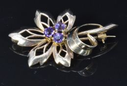 A 9ct gold brooch set with amethysts, 4 x 2.3cm, 4.7g