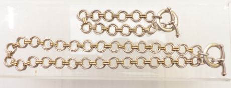 A Links of London silver necklace and matching bracelet made up of circular links