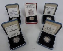 Five Royal Mint silver proof cased £1 coins, with certificates