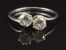 A platinum ring set with two round cut diamonds, each approximately 0.4ct, with receipt, size M, 2.