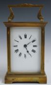 Early to mid-20thC French brass carriage clock, the enamel Roman dial with blued steel hands, the