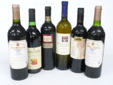 Three bottles of New World red wines including Chapel Vineyard Merlot 2011 13.5% vol, Blossom Hill