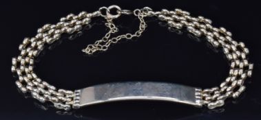 A 9ct gold identity bracelet, 13.2g