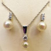 Majorica silver necklace set with a faux pearl and cubic zirconia, with matching earrings