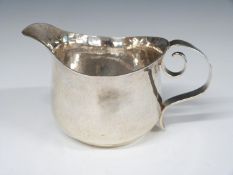 Edward VII Arts and Crafts hallmarked silver jug with hammered body, Britannia standard London 1902,
