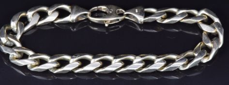 A 9ct gold curb link bracelet, 41g