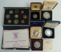 Four Royal Mint cased silver proof coins, a Festival of Britain crown and a 1984 deluxe cased set,