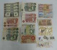 A collection of UK and overseas banknotes including ten shilling Fforde pair of consecutives, four