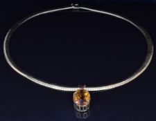 An 18ct gold snake chain/ necklace and an 18ct gold pendant set with a large oval cut citrine, 44.