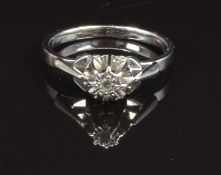 An 18ct white gold ring set with a diamond, size M, 3.2g