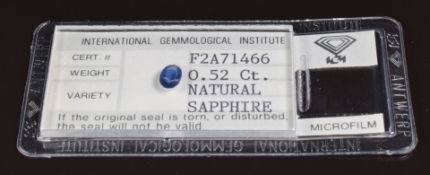 A loose natural 0.52ct sapphire with certificate