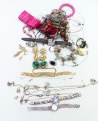A collection of costume and silver jewellery including earrings