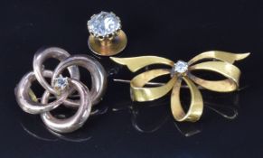 Victorian yellow metal brooch set with a diamond, a Victorian stud set with paste and a brooch