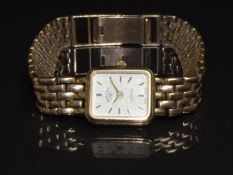 Rotary 9ct gold ladies wristwatch with gold hands, hour markers and dial and quartz moevement, on