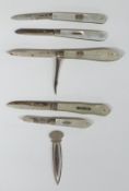 Five hallmarked silver bladed mother of pearl handled folding fruit knives, one with two tools,
