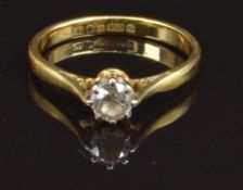 An 18ct gold ring set with a diamond of approximately 0.2ct, size J, 2g