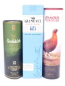 Three bottles of whisky comprising The Glenlivet Founder's Reserve Single Malt and The Famous Grouse