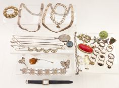 A collection of silver jewellery including locket, chains, necklaces. filigree, bracelets and