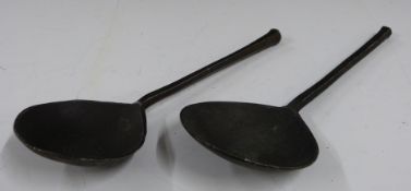 Two 17th/18thC pewter spoons with touch marks, one DG the other possibly the same but indistinct,