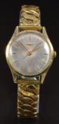 Longines 14ct gold gentleman's wristwatch ref. 6747 with gold hands and hour markers, silver dial