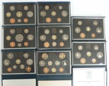Eight Royal Mint UK proof coinage deluxe case sets 1987-1994, with certificates