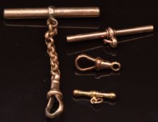 A 9ct gold T bar, 1.4g, 15ct gold clip, 1g and another T bar