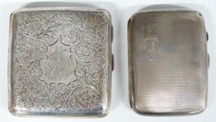 Two hallmarked silver cigarette cases, one Victorian with engraved scrolling decoration,