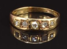 Victorian 18ct gold ring set with five rose cut diamonds, size Q, 3.9g