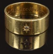 An 18ct gold ring set with a diamond in a star setting, size Z, 14.2g