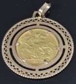 A 9ct gold pendant set with an 1899 gold full sovereign, 13g