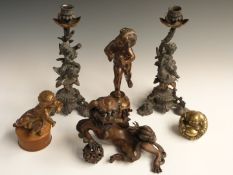 Spelter, bronze and brass items including a pair of figural candlesticks decorated with putti and