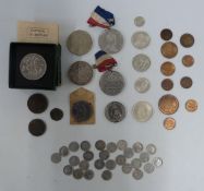 A tin containing Victorian crowns, uncirculated South African silver coins and Jersey doubles,