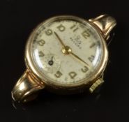 Record 9ct gold ladies wristwatch with subsidiary seconds dial, gold hands and Arabic numerals and