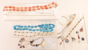 A pearl necklace, coral necklace, silver St Christopher, silver and agate brooch, silver pendants,