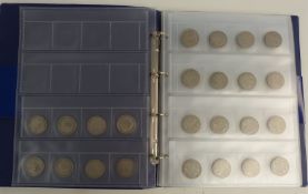 A collector's album containing a collection of UK half crowns, largely 1931-33, approximately