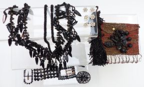 A collection of jet jewellery including necklaces, beads, buckles, cut steel beaded purse, etc