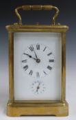 19thC or early 20thC brass cased repeating carriage clock, the white enamel dial with Roman numerals