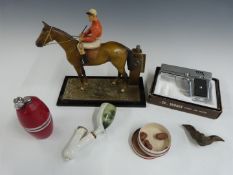 Horse and jockey table lighter, boxed Penguin Aurora 45 novelty lighter formed as a pistol,