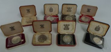 Eight various Royal Mint proof crowns, to include Gibraltar, Isle of Man, cased no certificates