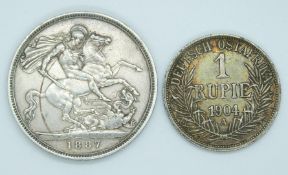 Deutsch Ostafrika one silver Rupie and an 1887 Jubilee Crown