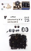 A collection of jet beads, buttons, etc