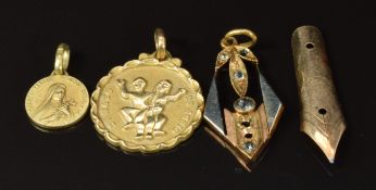 Three yellow metal pendants and a 14ct gold nib