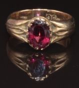 A 9ct gold ring set with a faux garnet, size I, 3.8g