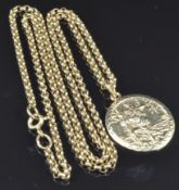 A 9ct gold St Christopher engraved verso 'be my guide' on a 9ct gold chain, 9.3g, length 55cm