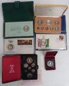 Six coin packs including Canada coin set, cased with certificate, 1977 Cook Islands set, cased
