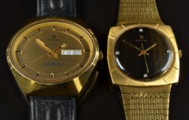 Two Revue gentleman's wristwatches one with day and date aperture, sweep centre seconds hand,