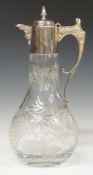 Modern hallmarked silver mounted cut glass decanter with mask decoration to spout, Sheffield 1994,