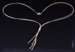 A 9ct gold two strand necklace with a textured slider, 11.5g