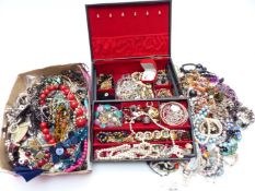 A collection of costume jewellery including beads, necklaces, etc